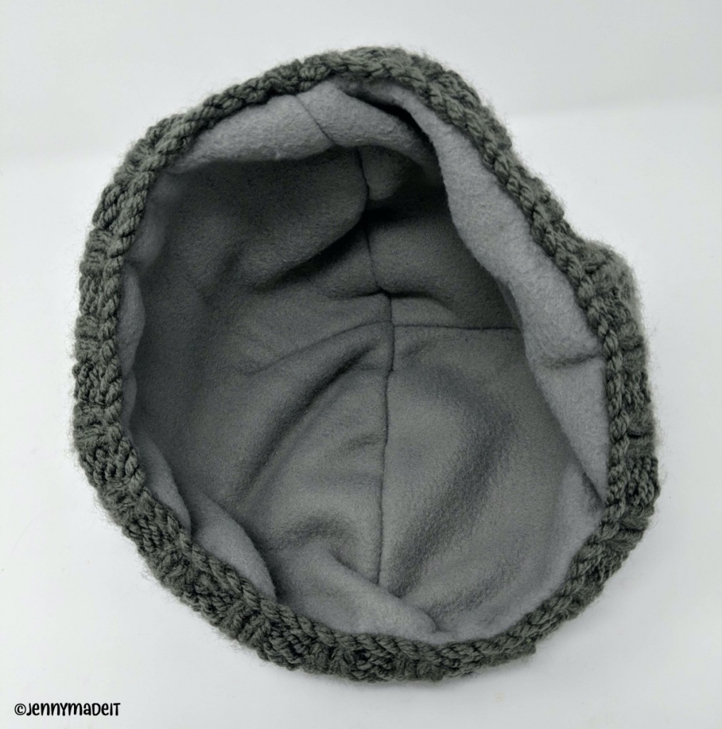 This is a photo of a knit hat with a sewn in fleece lining.
