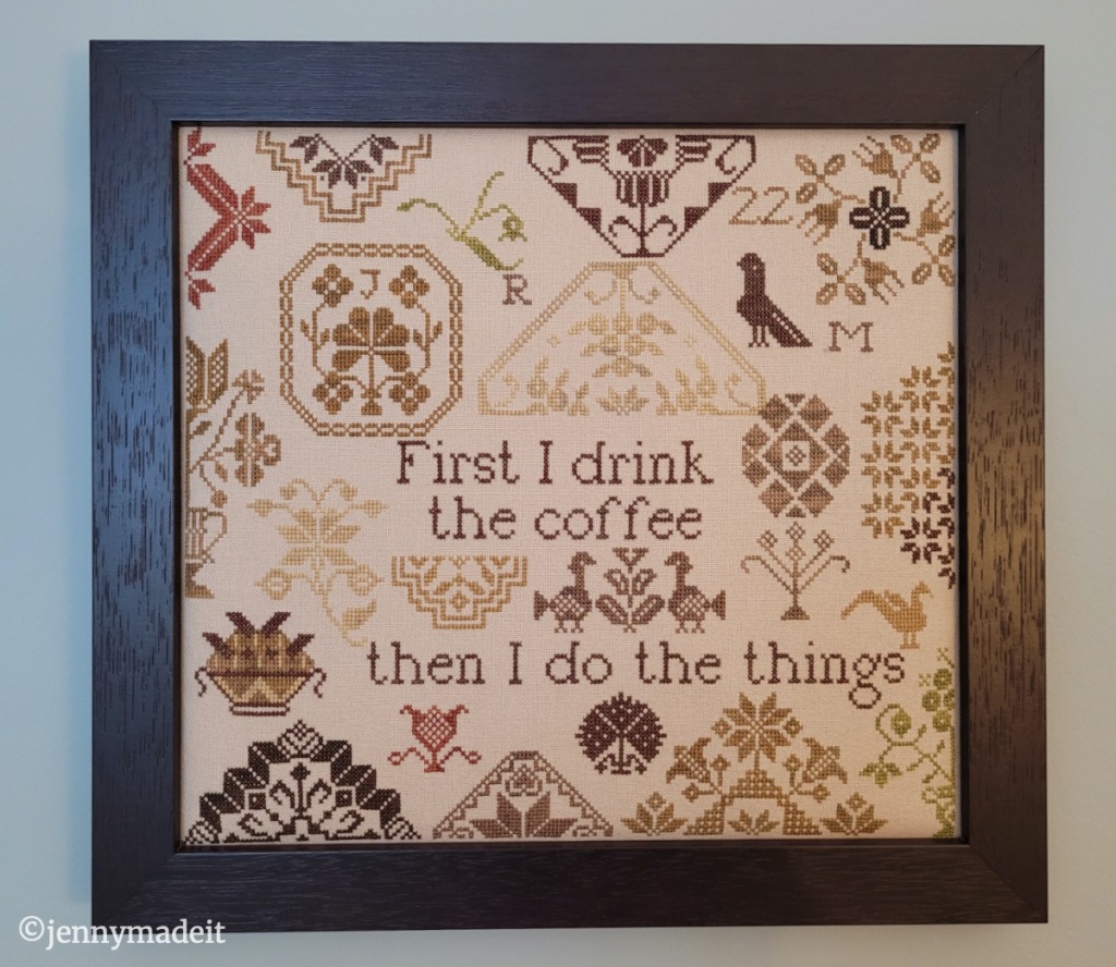 finished and framed cross stitch entitled Coffee Quaker
